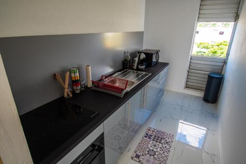 Köök või kööginurk majutusasutuses Sibèl Appart