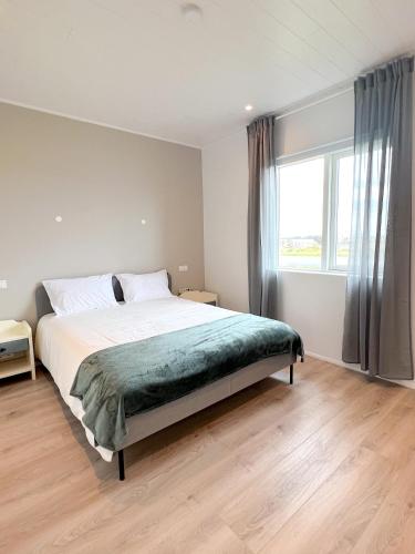 Postel nebo postele na pokoji v ubytování Home in Selfoss/Golden Circle - Aurora Rentals
