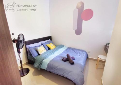 Кровать или кровати в номере FE Cozy Cameron Homestay Family 8 pax 3BR Palas Horizon Brinchang 金马伦民宿 8人3房