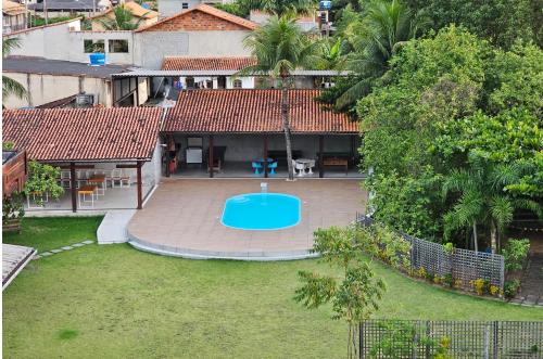an aerial view of a house with a yard at HOTEL INDIANO in Rio Bonito