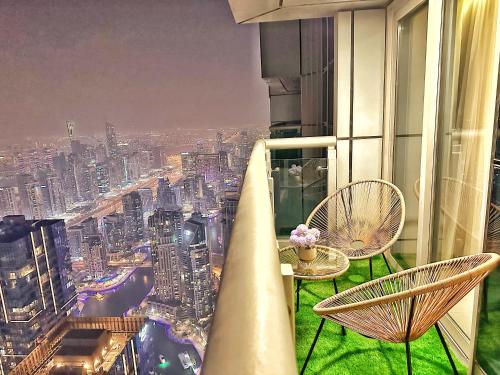 a room with a view of a city at Life Above Clouds in Dubai