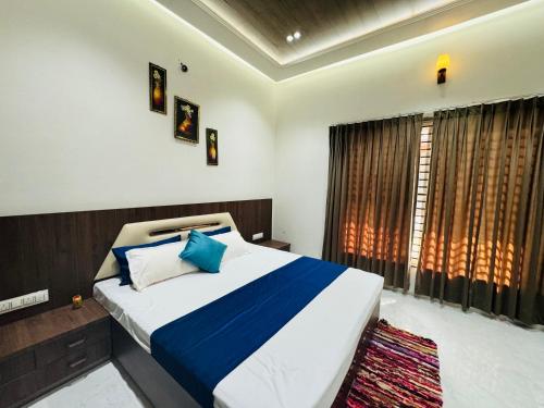 Katil atau katil-katil dalam bilik di KRISHNA HOME STAY