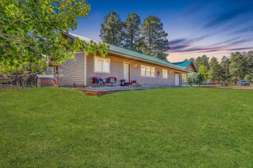 a house with a lawn in front of it at 28 Dragoon Ct in Pagosa Springs