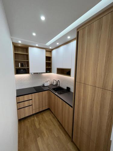 Η κουζίνα ή μικρή κουζίνα στο Perla Lux 2 Apartments