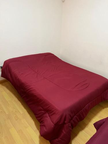 En eller flere senge i et værelse på Chacabuco La Loma