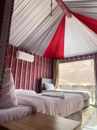 Letto o letti in una camera di V D C Wadi Rum