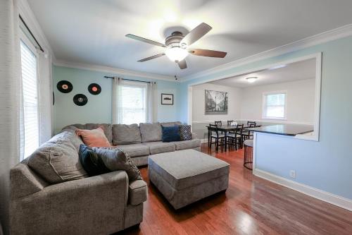 a living room with a couch and a table at Rockin' West Nashville Retreat - 5 miles from downtown in Nashville