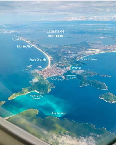an aerial view of the islands of austinia and antarctica at Mar de Arraial, Suites da Ju in Arraial do Cabo