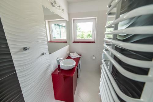 Ванна кімната в Silver One Apartments