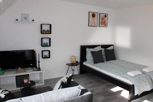 Krevet ili kreveti u jedinici u objektu Wohlfühl & Schickes Apartment