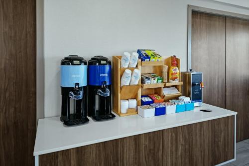 a counter with two large water heaters on it at Holiday Inn Express Lewiston by IHG in Lewiston