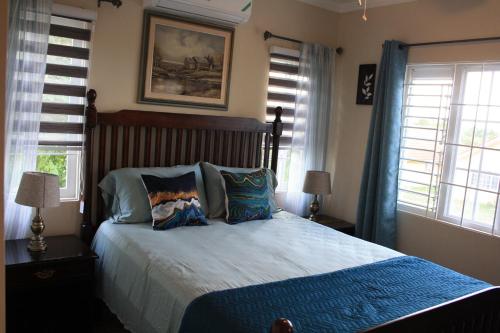 Cama o camas de una habitación en Soleil Palm View Villa