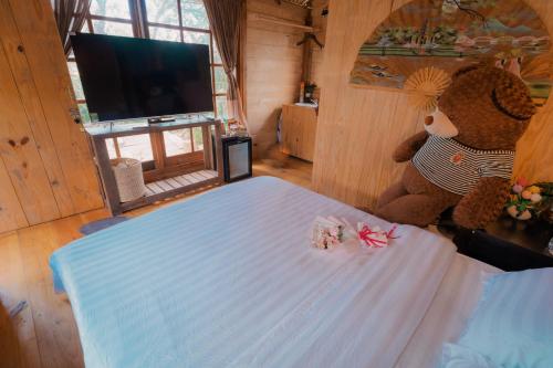 Телевизор и/или развлекательный центр в Mơ Garden Retreat DaLat