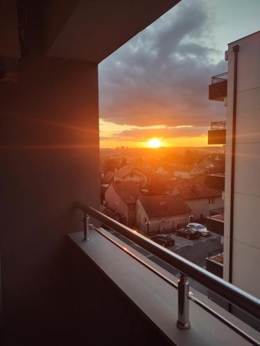 a view from a window of a sunset at Apartman in Mali Mokri Lug