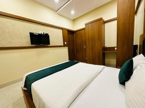 Postel nebo postele na pokoji v ubytování HOTEL BKC DOWNTOWN - NEAR US EMBASSY