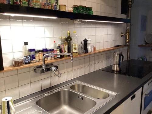 a kitchen sink with a faucet on a counter at 4 star holiday home in TORHAMN-By Traum in Torhamn