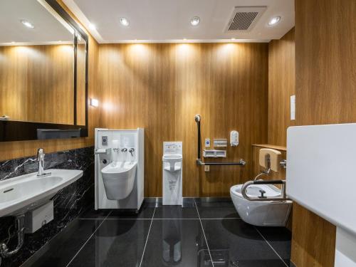 Koupelna v ubytování APA Hotel Hatchobori Ekimae