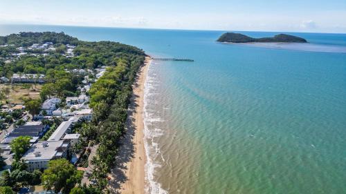 an aerial view of a beach and the ocean at Sarayi Boutique Hotel in Palm Cove