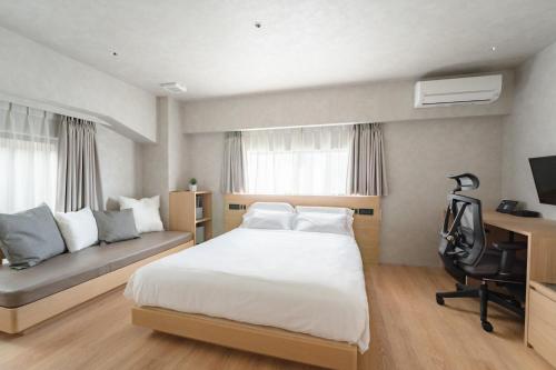 Giường trong phòng chung tại 脈 -MYAKU PRIVATE SAUNA-