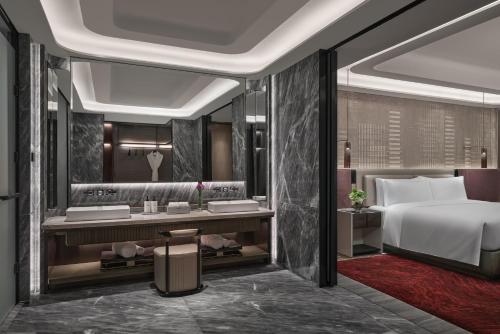 a rendering of a bedroom with a bed and a bathroom at InterContinental Shenzhen WECC by IHG in Shenzhen