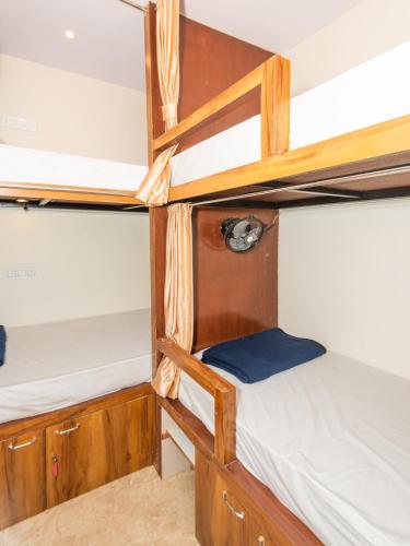 a couple of bunk beds on a boat at Hotel BKC Fortune in Mumbai