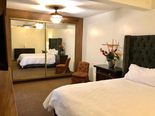 Ένα ή περισσότερα κρεβάτια σε δωμάτιο στο Casa Bonita cerca de Zona Dorada