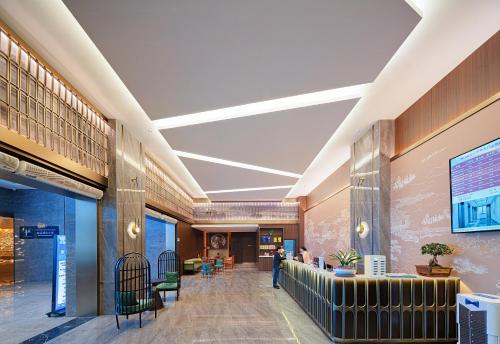 a rendering of the lobby of a hospital at Zhangjiajie Metropolo Hotel in Zhangjiajie