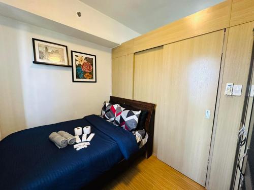 Krevet ili kreveti u jedinici u okviru objekta 1 Bedroom with balcony Near Airport Bgc Taguig City