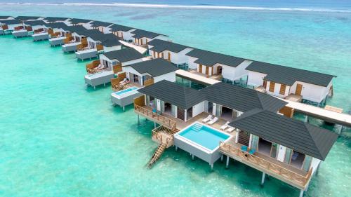an aerial view of a resort in the water at Joy Island Maldives All Inclusive Resort in Male City