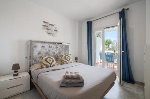 Säng eller sängar i ett rum på First Line Apartment in Puerto Banus