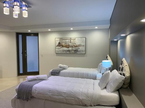 Postel nebo postele na pokoji v ubytování Spacious Putney Studio-2 Beds, Short drive to Parklands & Olympic