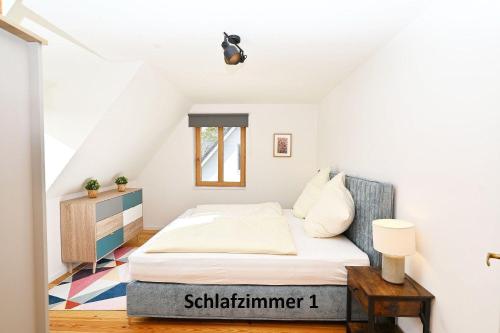 Llit o llits en una habitació de Ferienwohnung-Weitblick