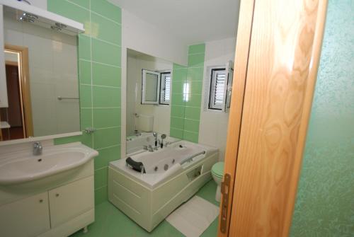 Koupelna v ubytování Springs Apartments & Rooms