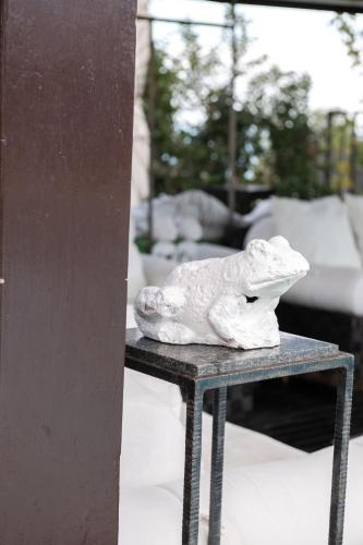a white statue sitting on top of a table at Villa VERNEY in Albisola Superiore