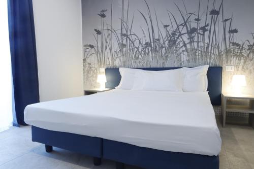 Postel nebo postele na pokoji v ubytování Residence Molino - Holiday Apartments