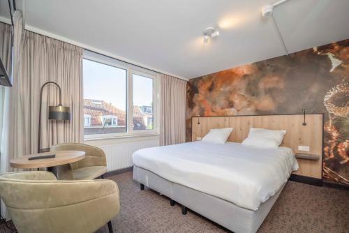 Postel nebo postele na pokoji v ubytování Fletcher Hotel-Restaurant Waalwijk