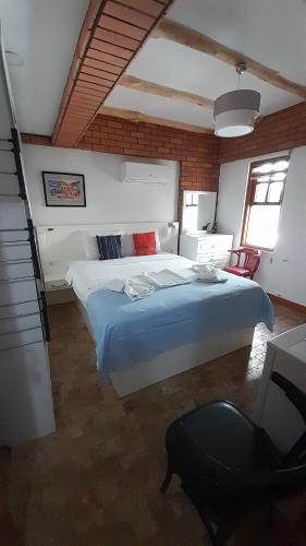 Ένα ή περισσότερα κρεβάτια σε δωμάτιο στο BAT Apart Otel