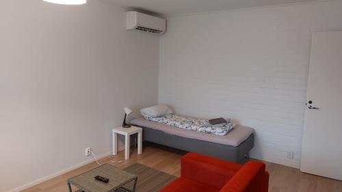מיטה או מיטות בחדר ב-Apartment Lapväärtti, kaksio