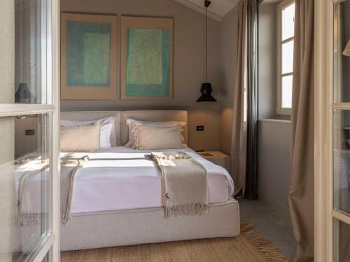 Posteľ alebo postele v izbe v ubytovaní San Canzian Hotel & Residences - Small Luxury Hotels of the World