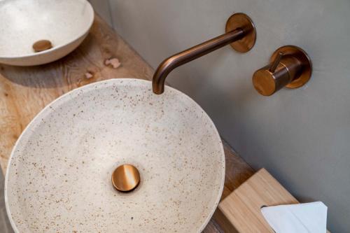 a close up of a white bowl on a table at Equilodge 't Blommeke - Reconnect with nature in Bruges