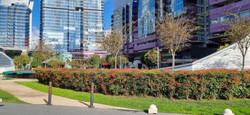 a park in a city with tall buildings at Maslak inn in Istanbul