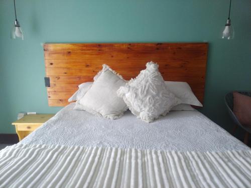 Ένα ή περισσότερα κρεβάτια σε δωμάτιο στο Ebenezer Self Catering