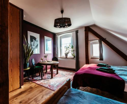 Postel nebo postele na pokoji v ubytování Kwieci Dom Gościnny sloowfood w Górach Izerskich