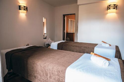 Postel nebo postele na pokoji v ubytování Tamarina Golf & Spa Boutique Hotel