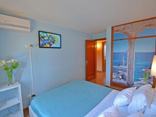 Ένα ή περισσότερα κρεβάτια σε δωμάτιο στο Villa Benestar by Interhome