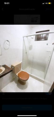 a bathroom with a toilet in a room at Eco Pousada Mentawai in Itacaré
