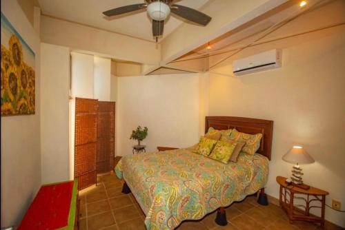 Postel nebo postele na pokoji v ubytování Buena Vista Coco