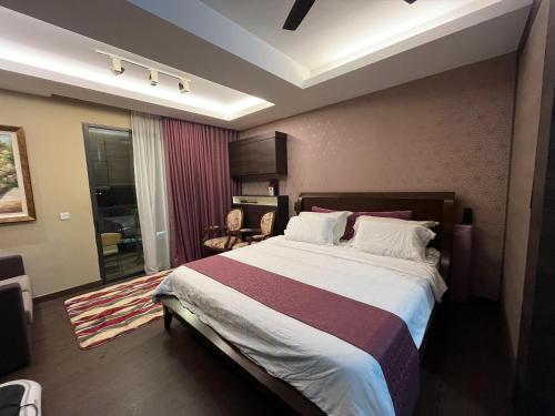 Postel nebo postele na pokoji v ubytování Guest Studio/Suite Condominum Near Batu Caves