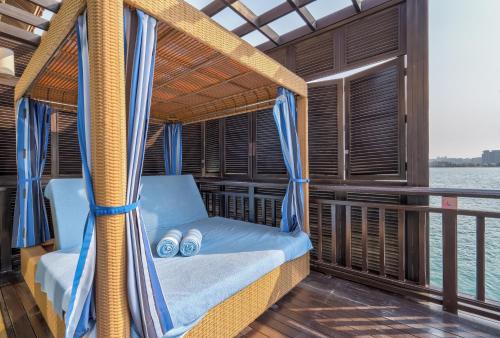 a swing on the deck of a boat at Anantara The Palm Dubai Resort in Dubai