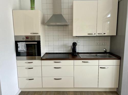 Η κουζίνα ή μικρή κουζίνα στο Ferienwohnung Loft Münster
